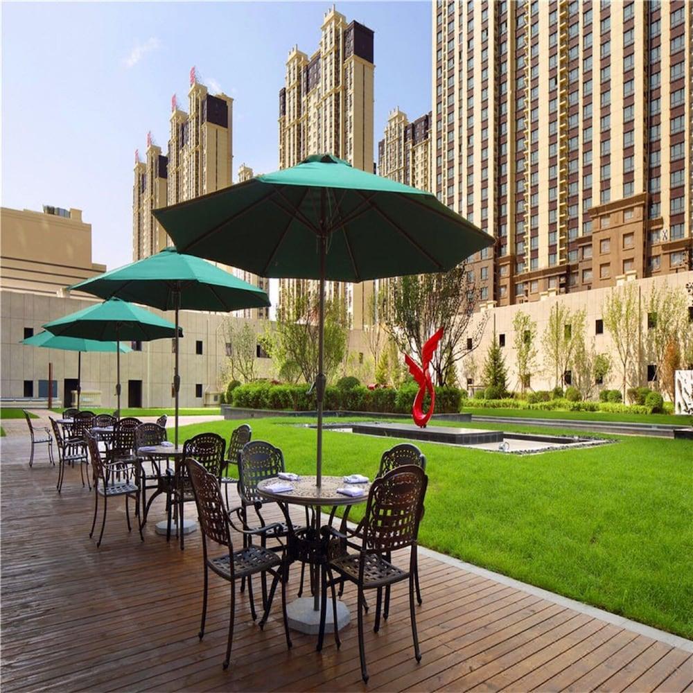 Отель Wanda Realm Siping Экстерьер фото