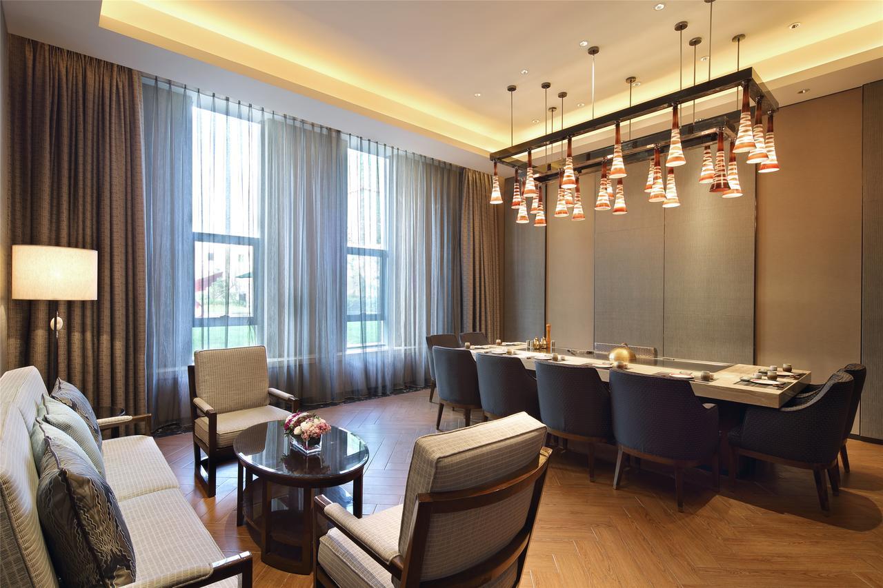 Отель Wanda Realm Siping Экстерьер фото